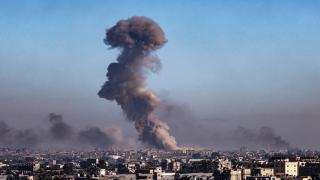 Israel pounds Gaza as Iran attack threat puts region on edge