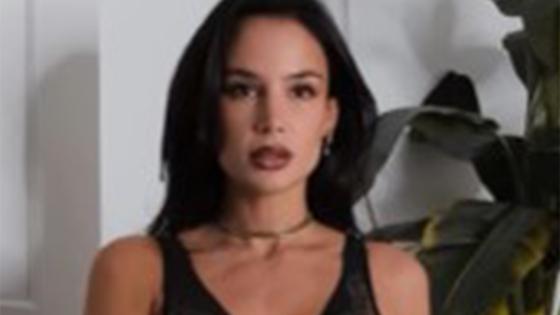 Chelsea legend’s daughter smoulders as she goes braless in plunging black dress and tries on four sets of lingerie