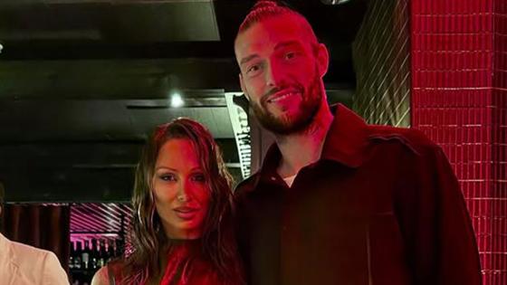 Andy Carroll looks loved-up with Lou Teasdale as new girlfriend puts on leggy display in bold outfit