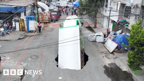 Soda truck falls into sinkhole in Mexico City