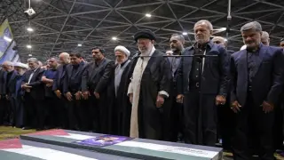Iran, allies ready Israel response as funerals held for militant leaders
